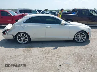 2013 Cadillac ATS Premium z VIN 1G6AE5S35D0129175, wystawiony jako IAAI lot #42037872 z przebiegiem 95 747 mil mil oraz . Historia ofert i sprzedaży dostępna na DreamBid. Obrazek 13.