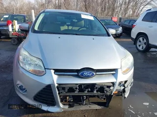2012 Ford Focus SEL with VIN 1FAHP3M22CL413512, listed as a IAAI auction lot 41758125 with 161,857 mi miles. Bid and sale history available at carsss.com. Image 12.