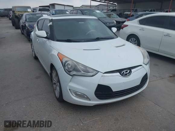 2013 Hyundai Veloster w/Black Int с VIN KMHTC6AD5DU166601, выставлен на аукционе IAAI как лот 42182995 с пробегом 143 106 миль миль и . История ставок и продаж доступна на DreamBid. Изображение 1.
