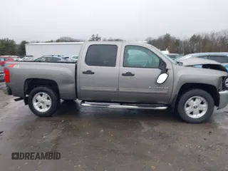 2013 Chevrolet Silverado 1500 LT with VIN 3GCPKSE75DG275651, listed as a IAAI auction lot 41805883 with 142,729 mi miles. Bid and sale history available at carsss.com. Image 14.