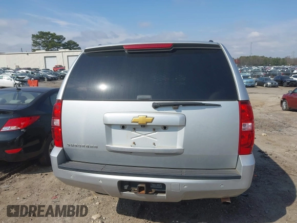 2013 Chevrolet Suburban LS z VIN 1GNWKLEGXDR305591, wystawiony jako IAAI lot #41785334 z przebiegiem 203 613 mil mil oraz . Historia ofert i sprzedaży dostępna na DreamBid. Obrazek 16.