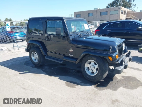 2001 Jeep Wrangler Sahara z VIN 1J4FA59S41P313113, wystawiony jako IAAI lot #42266173 z przebiegiem 125 792 mil mil oraz . Historia ofert i sprzedaży dostępna na DreamBid. Obrazek 1.