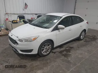 2018 Ford Focus SE with VIN 1FADP3F29JL312721, listed as a IAAI auction lot 41012098 with 126,214 mi miles. Bid and sale history available at carsss.com. Image 2.