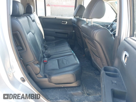 2011 Honda Pilot Touring with VIN 5FNYF4H96BB012122, listed as a IAAI auction lot 42071924 with 211,000 mi miles. Bid and sale history available at carsss.com. Image 8.