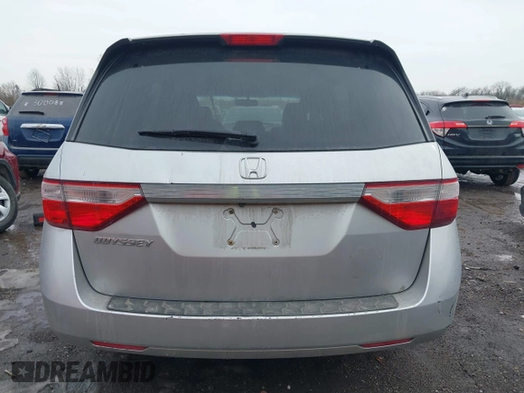 2013 Honda Odyssey EX-L with VIN 5FNRL5H63DB007682, listed as a IAAI auction lot 41408103 with 201,453 mi miles and . Bid and sale history available at carsss.com. Image 16.