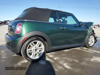 2015 MINI Convertible with VIN WMWZN3C53FT862148, listed as a Copart auction lot 76911714 with 56,065 mi miles and Salvage title. Bid and sale history available at DreamBid. Image 3.