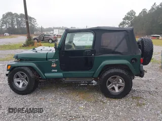 2000 Jeep Wrangler Sahara with VIN 1J4FA59SXYP701098, listed as a IAAI auction lot 41592872 with 1 mi miles. Bid and sale history available at carsss.com. Image 13.