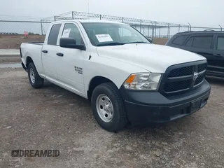 2023 Ram 1500 Tradesman z VIN 1C6RR6FG9PS527089, wystawiony jako IAAI lot #42261047 z przebiegiem 20 684 mil mil oraz . Historia ofert i sprzedaży dostępna na DreamBid. Obrazek 1.
