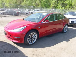 2018 Tesla Model 3 Long Range Battery z VIN 5YJ3E1EA3JF047287, wystawiony jako IAAI lot #42099771 z przebiegiem 120 470 mil mil oraz . Historia ofert i sprzedaży dostępna na DreamBid. Obrazek 19.