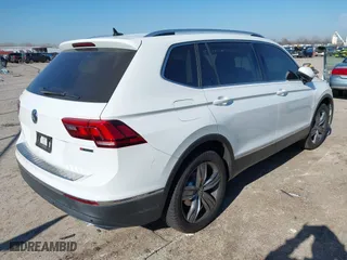 2019 Volkswagen Tiguan SEL Premium with VIN 3VV4B7AX0KM007788, listed as a IAAI auction lot 41227707 with 67,859 mi miles. Bid and sale history available at carsss.com. Image 4.