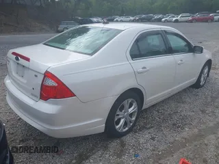 2012 Ford Fusion SE with VIN 3FAHP0HG1CR320910, listed as a IAAI auction lot 42785831 with 115,986 mi miles and . Bid and sale history available at DreamBid. Image 4.