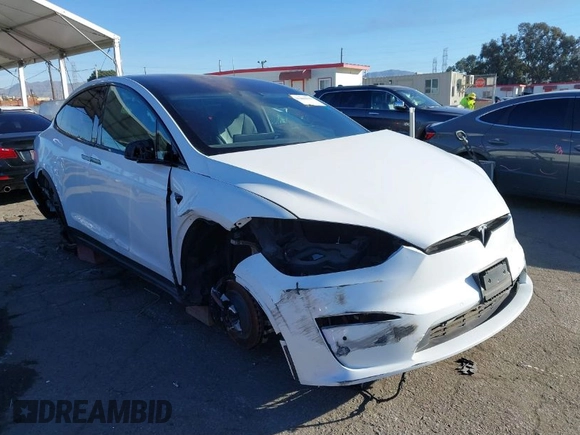 2022 Tesla Model X with VIN 7SAXCBE56NF329657, listed as a IAAI auction lot 41400629 with Not Provided miles and . Bid and sale history available at DreamBid. Image 1.