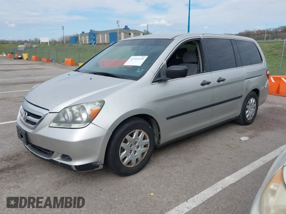 2007 Honda Odyssey LX z VIN 5FNRL38297B073742, wystawiony jako IAAI lot #41919129 z przebiegiem 152 584 mil mil oraz . Historia ofert i sprzedaży dostępna na DreamBid. Obrazek 2.