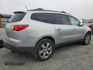 2012 Chevrolet Traverse LTZ z VIN 1GNKRLED8CJ262091, wystawiony jako Copart lot #55527805 z przebiegiem Nie podano mil oraz Szkoda całkowita • Salvage title. Historia ofert i sprzedaży dostępna na DreamBid. Obrazek 3.