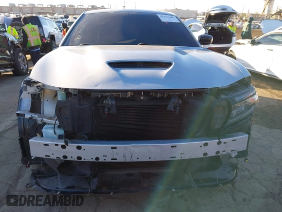 2020 Dodge Charger R/T with VIN 2C3CDXCT1LH219604, listed as a IAAI auction lot 41313469 with 58,665 mi miles and . Bid and sale history available at carsss.com. Image 13.