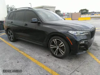 2021 BMW X7 M50i with VIN 5UXCX6C06M9H34992, listed as a IAAI auction lot 41513197 with 22,029 mi miles. Bid and sale history available at carsss.com. Image 1.