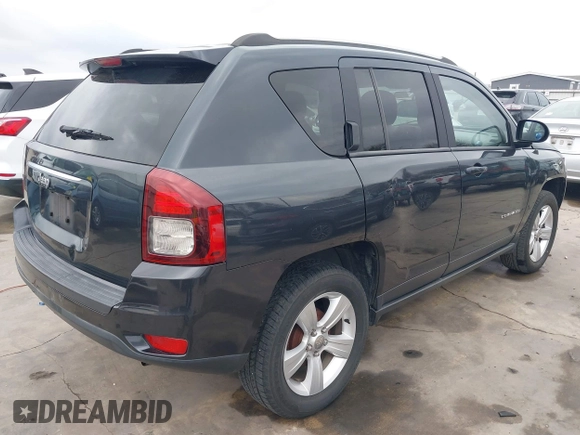 2014 Jeep Compass Sport with VIN 1C4NJCBB0ED647937, listed as a IAAI auction lot 41444062 with 135,679 mi miles and . Bid and sale history available at DreamBid. Image 4.