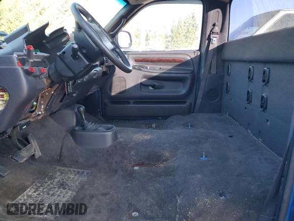 1999 Dodge Ram 2500 with VIN 3B7KF26Z0XM566658, listed as a Copart auction lot 82927584 with 0 mi miles and Salvage Title. Bid and sale history available at carsss.com. Image 7.