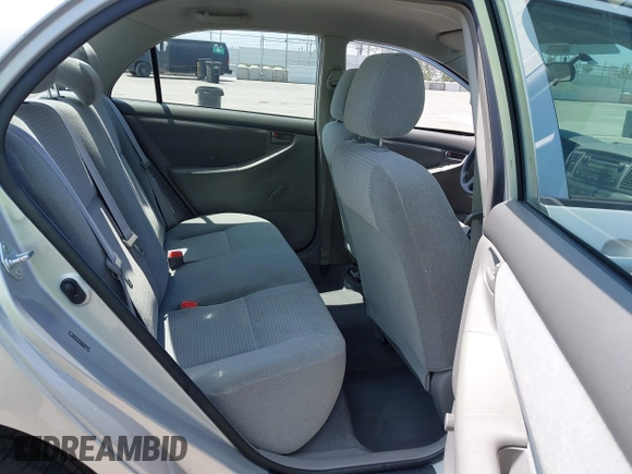 2007 Toyota Corolla CE with VIN JTDBR32E570108648, listed as a IAAI auction lot 42509739 with 61,309 mi miles and . Bid and sale history available at DreamBid. Image 8.