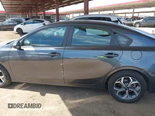 2021 Kia Forte LXS z VIN 3KPF24AD7ME294409, wystawiony jako IAAI lot #42124606 z przebiegiem 91 567 mil mil oraz . Historia ofert i sprzedaży dostępna na DreamBid. Obrazek 14.