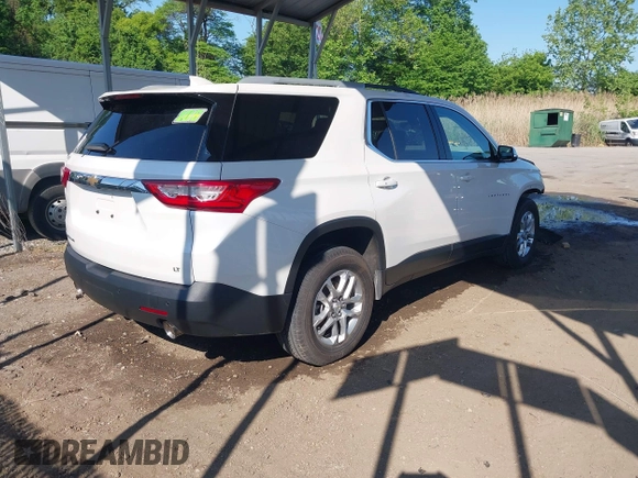 2018 Chevrolet Traverse LT Cloth z VIN 1GNEVGKWXJJ270664, wystawiony jako IAAI lot #42176492 z przebiegiem 73 534 mil mil oraz . Historia ofert i sprzedaży dostępna na DreamBid. Obrazek 4.