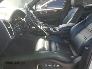 2021 Porsche Cayenne with VIN WP1AA2AYXMDA00148, listed as a Copart auction lot 52647565 with 27,977 mi miles and Salvage title. Bid and sale history available at DreamBid. Image 7.