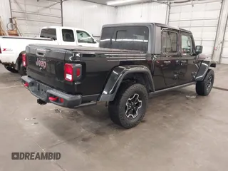 2021 Jeep Gladiator Rubicon with VIN 1C6JJTBGXML529108, listed as a IAAI auction lot 42139924 with 32,204 mi miles and . Bid and sale history available at DreamBid. Image 4.
