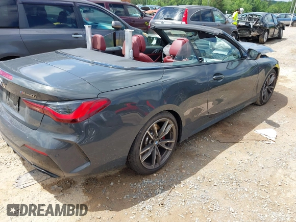 2021 BMW 4 Series M440i with VIN WBA53AT05MCG89665, listed as a IAAI auction lot 42319456 with Not provided miles and . Bid and sale history available at DreamBid. Image 4.