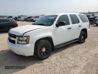 2014 Chevrolet Tahoe Commercial with VIN 1GNLC2E07ER223705, listed as a Copart auction lot 57682085 with 107,507 mi miles and Salvage title. Bid and sale history available at DreamBid. Image 1.