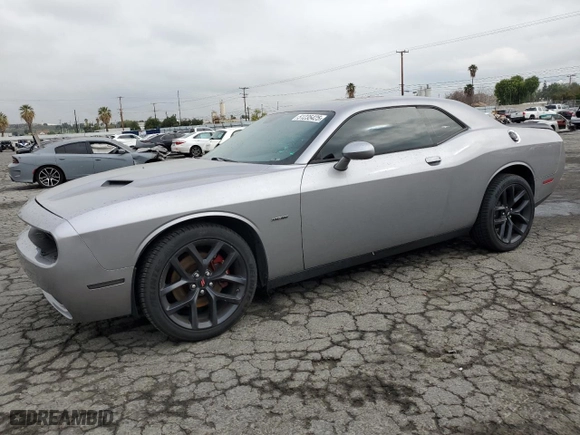 2018 Dodge Challenger R/T with VIN 2C3CDZBT9JH265434, listed as a Copart auction lot 51235425 with 106,779 mi miles and Salvage Title. Bid and sale history available at carsss.com. Image 1.