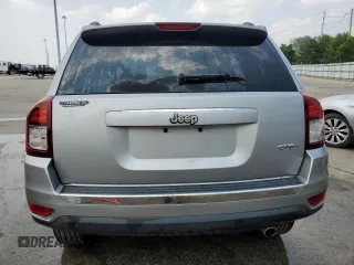 2016 Jeep Compass High Altitude z VIN 1C4NJCEA9GD716047, wystawiony jako Copart lot #59489505 z przebiegiem 103 827 mil mil oraz Czysty tytuł • Clean title. Historia ofert i sprzedaży dostępna na DreamBid. Obrazek 6.