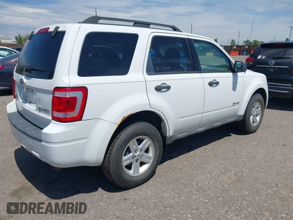2009 Ford Escape Hybrid with VIN 1FMCU49349KC20129, listed as a IAAI auction lot 42777689 with 171,604 mi miles and . Bid and sale history available at DreamBid. Image 4.