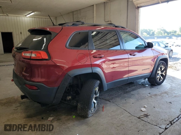 2015 Jeep Cherokee Trailhawk with VIN 1C4PJMBS1FW745928, listed as a Copart auction lot 62032585 with 132,559 mi miles and Salvage title. Bid and sale history available at DreamBid. Image 3.