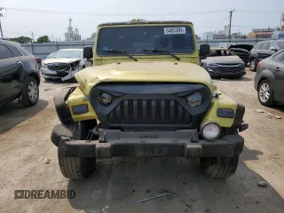 2003 Jeep Wrangler Sahara with VIN 1J4FA59S03P313418, listed as a Copart auction lot 64883094 with 184,658 mi miles and Salvage title. Bid and sale history available at DreamBid. Image 5.