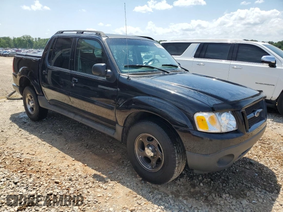 2005 Ford Explorer Sport Trac XLS with VIN 1FMZU67K65UA29830, listed as a Copart auction lot 54941185 with 214,220 mi miles and Salvage title. Bid and sale history available at DreamBid. Image 4.