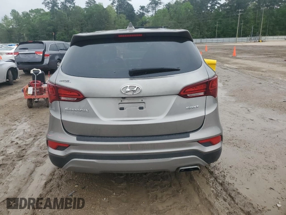 2017 Hyundai Santa Fe 2.4L z VIN 5NMZT3LBXHH038022, wystawiony jako Copart lot #51060545 z przebiegiem 63 790 mil mil oraz Szkoda całkowita • Salvage title. Historia ofert i sprzedaży dostępna na DreamBid. Obrazek 6.