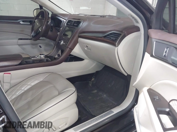 2017 Ford Fusion Titanium with VIN 3FA6P0SUXHR208653, listed as a IAAI auction lot 41312067 with 62,601 mi miles and . Bid and sale history available at DreamBid. Image 5.