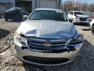 2012 Ford Taurus SEL z VIN 1FAHP2HW7CG138459, wystawiony jako Copart lot #53170075 z przebiegiem 194 617 mil mil oraz Czysty tytuł • Clean title. Historia ofert i sprzedaży dostępna na DreamBid. Obrazek 5.