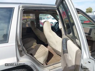 1994 Jeep Grand Cherokee Laredo with VIN 1J4GZ58YXRC325868, listed as a IAAI auction lot 42664900 with 220,149 mi miles and . Bid and sale history available at DreamBid. Image 8.