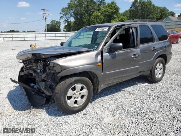 2004 Mazda Tribute ES with VIN 4F2CZ06114KM23991, listed as a Copart auction lot 60740264 with 208,759 mi miles and Salvage Title. Bid and sale history available at carsss.com. Image 1.