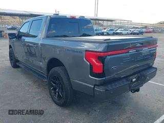 2023 Ford F-150 Lightning Pro with VIN 1FT6W1EV8PWG25191, listed as a IAAI auction lot 41716529 with 5,191 mi miles and . Bid and sale history available at DreamBid. Image 3.