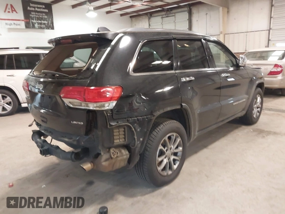 2015 Jeep Grand Cherokee Limited with VIN 1C4RJFBGXFC205124, listed as a IAAI auction lot 41405059 with 194,124 mi miles. Bid and sale history available at carsss.com. Image 4.
