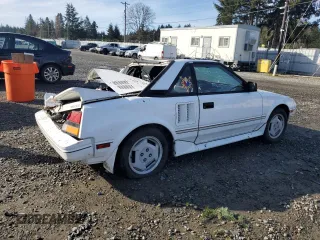 1988 Toyota MR2 z VIN JT2AW15CXJ0126257, wystawiony jako Copart lot #41524265 z przebiegiem 243 342 mil mil oraz Szkody całkowita. Historia ofert i sprzedaży dostępna na DreamBid. Obrazek 3.