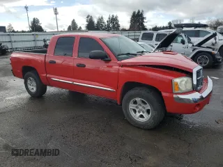2005 Dodge Dakota Laramie with VIN 1D7HW58N65S227595, listed as a Copart auction lot 45540055 with 155,717 mi miles and Salvage Title. Bid and sale history available at DreamBid. Image 4.