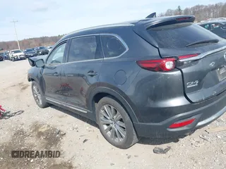 2021 Mazda CX-9 Signature with VIN JM3TCBEY5M0523199, listed as a IAAI auction lot 41916480 with 56,772 mi miles. Bid and sale history available at carsss.com. Image 3.