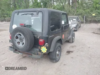 1995 Jeep Wrangler S with VIN 1J4FY19P4SP242027, listed as a IAAI auction lot 42149833 with 158,695 mi miles. Bid and sale history available at carsss.com. Image 4.