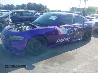 2006 Dodge Charger SRT-8 with VIN 2B3LA73W56H516962, listed as a IAAI auction lot 41987879 with 152,067 mi miles and . Bid and sale history available at carsss.com. Image 2.