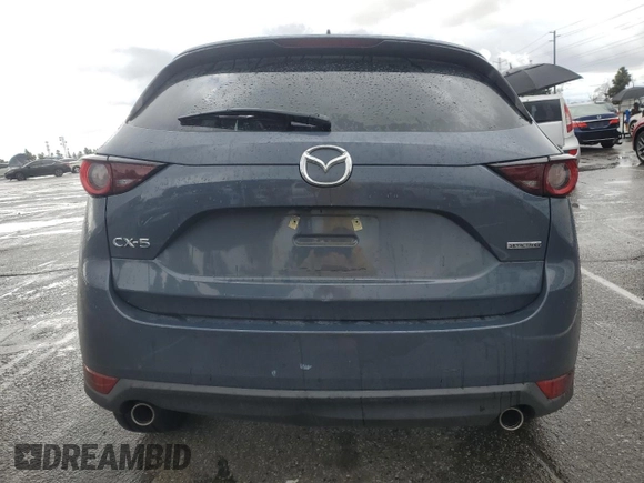 2021 Mazda CX-5 Touring with VIN JM3KFACM3M0420425, listed as a Copart auction lot 47993745 with 56,184 mi miles and Salvage Title. Bid and sale history available at carsss.com. Image 6.