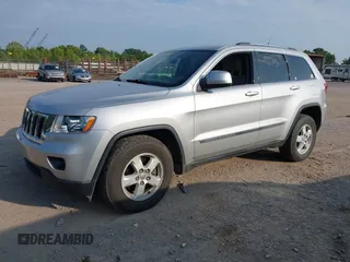 2011 Jeep Grand Cherokee Laredo with VIN 1J4RR4GG2BC514497, listed as a IAAI auction lot 42688206 with 88,822 mi miles and . Bid and sale history available at DreamBid. Image 2.