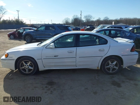 2001 Pontiac Grand Am GT with VIN 1G2NW52E11C244447, listed as a IAAI auction lot 41697883 with 81,983 mi miles. Bid and sale history available at carsss.com. Image 14.